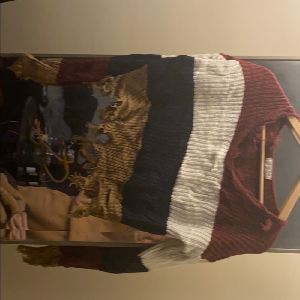 Distressed crop sweater